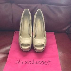 Nude leatherette heels.